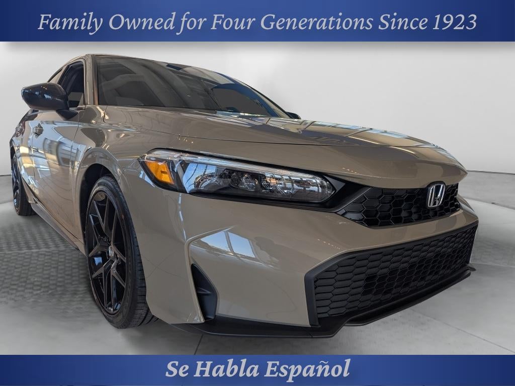 2026 Honda Civic Hatchback FWD Sport in Sand Dune Pearl — front three-quarter view